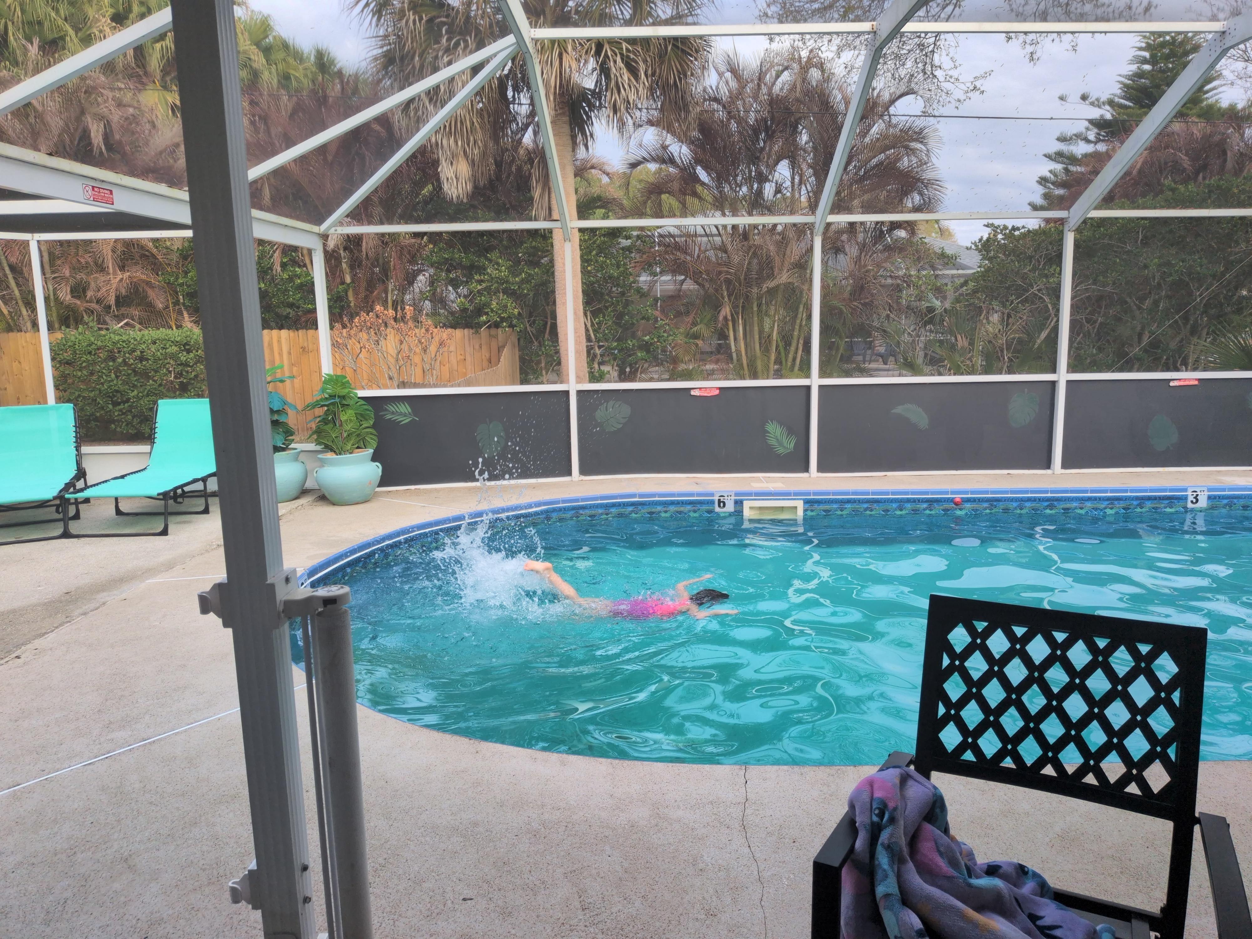 Practicing her swim strokes.