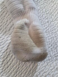 Socks dirty from walking on the floor