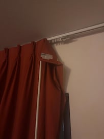 dirty curtain that was off the rack in several locations