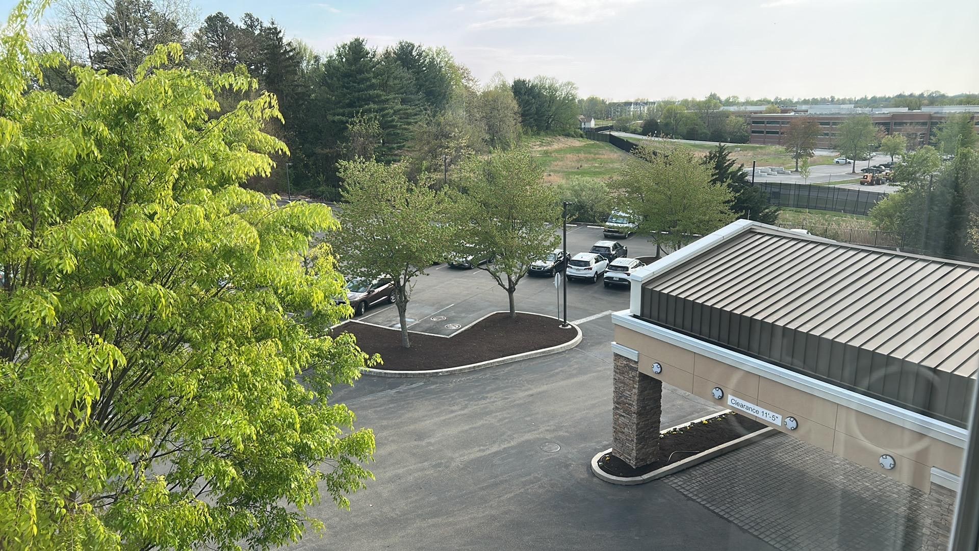 This is South Bound room, facing parking lot, major road 100 meter away