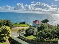 The villa is located at the end of this road overlooking another villa below