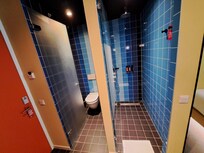 Room 274 toilet and walk-in shower cubicles.