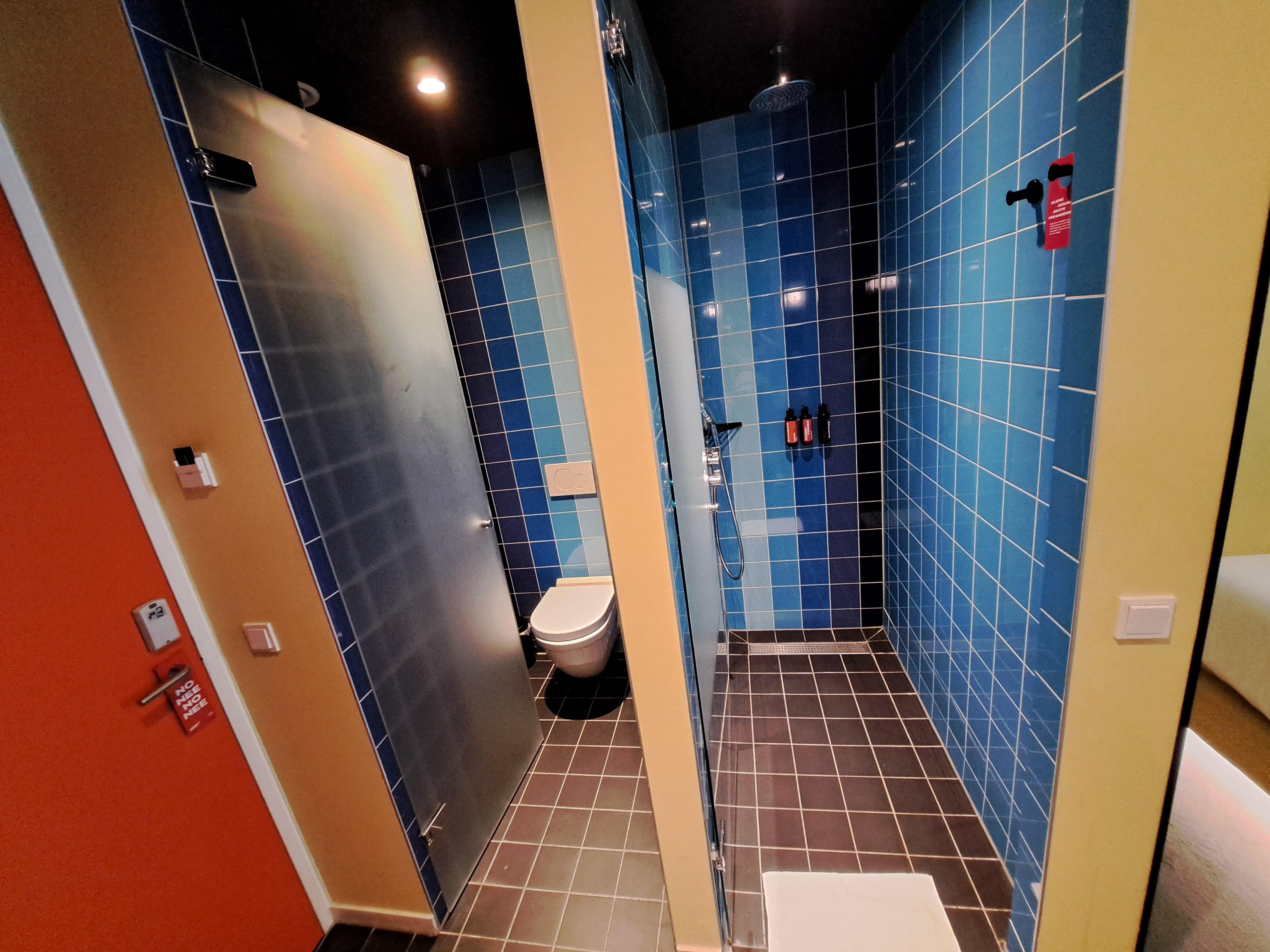 Room 274 toilet and walk-in shower cubicles.