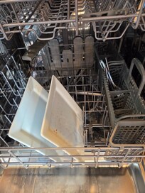 Dirty dishes in the dishwasher.