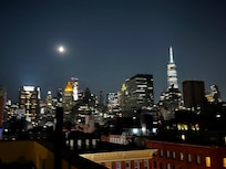 Night time view from rooftop deck.