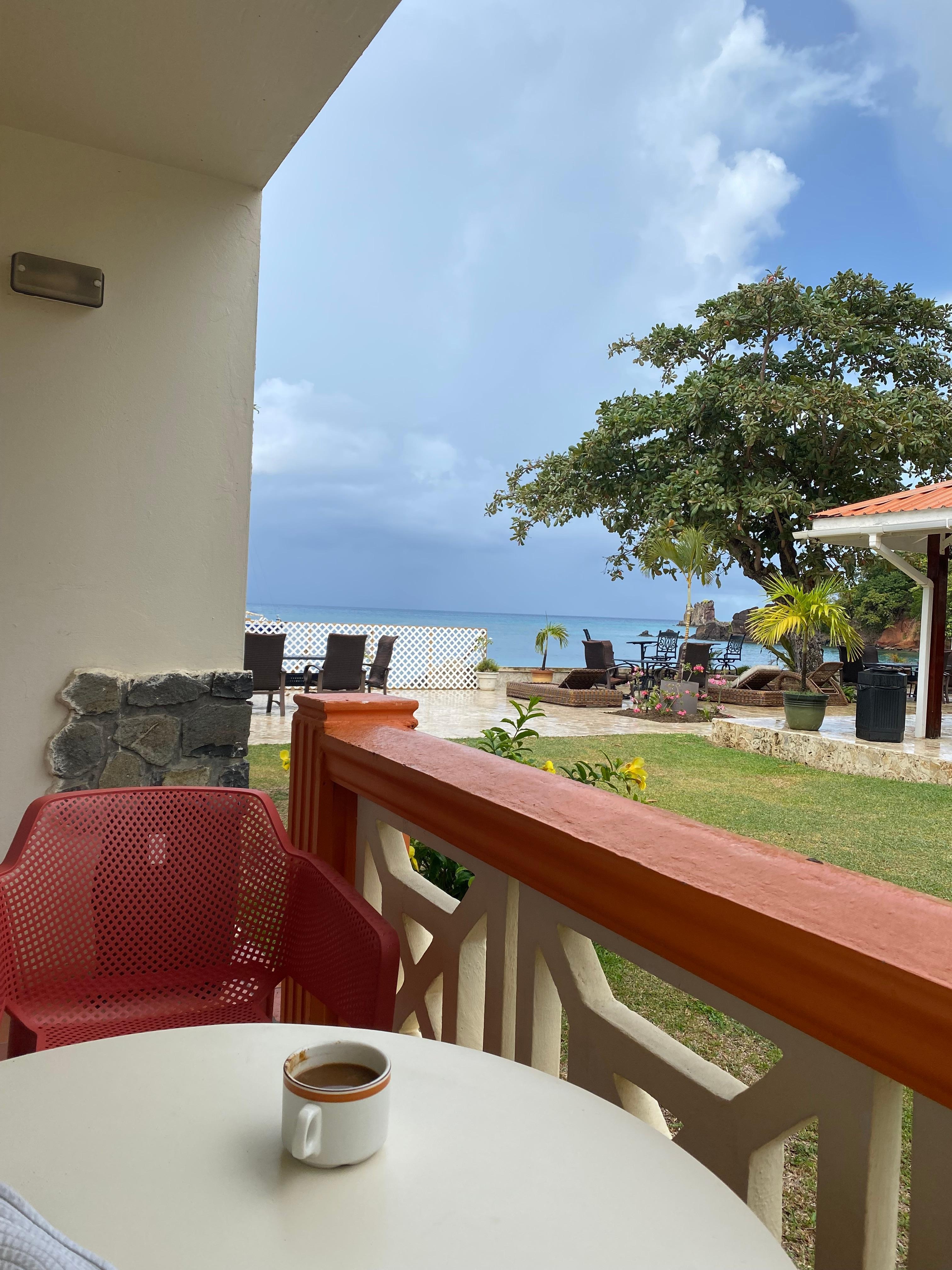 Patio with sea view and pool view.
