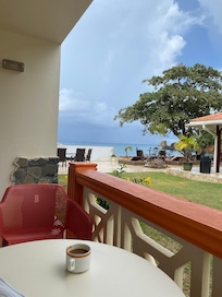 Patio with sea view and pool view.