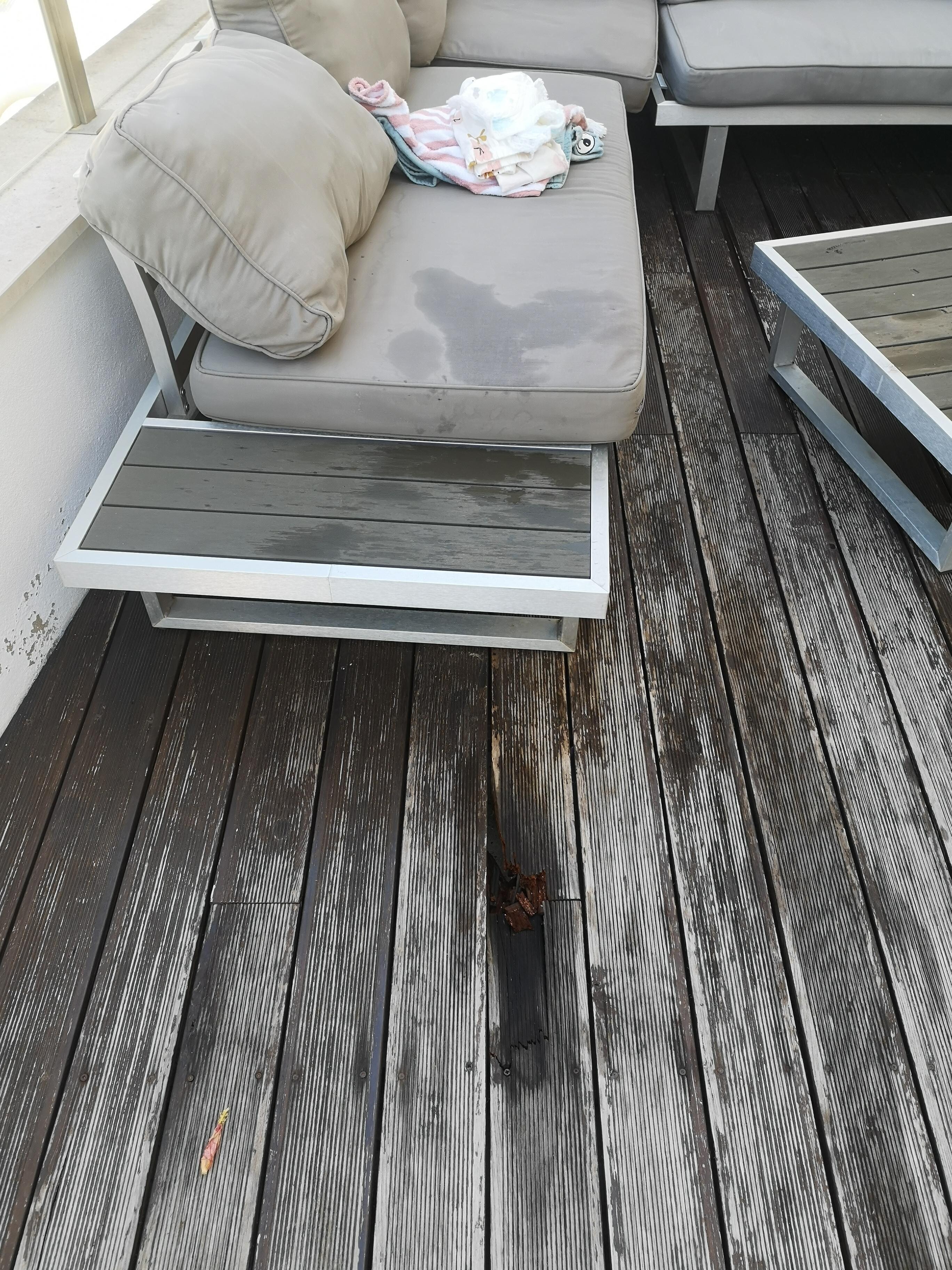 More large holes in the decking at the seating area