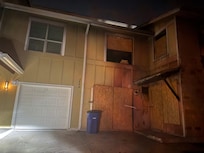 Adjacent property at night.