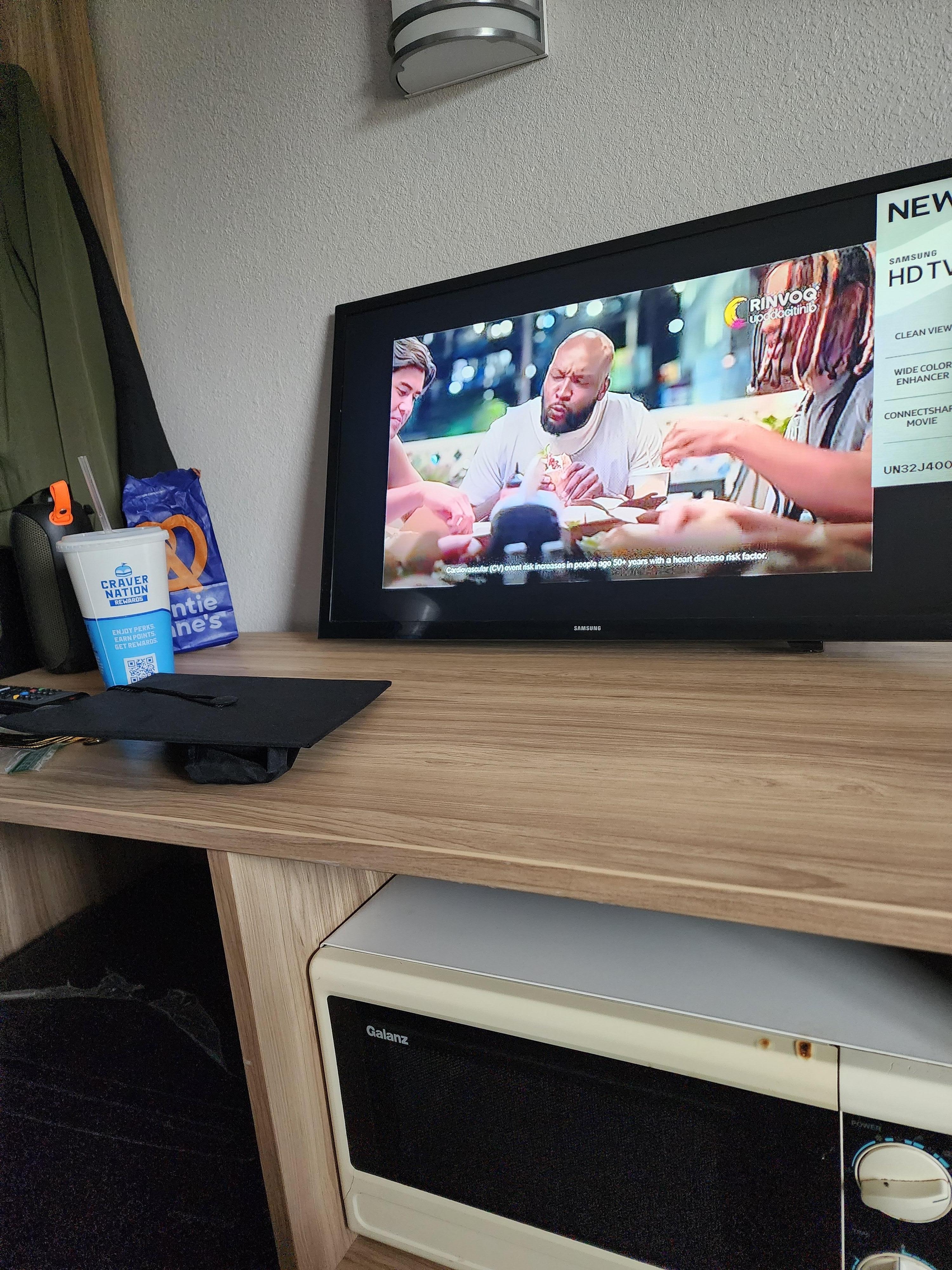 TV propped up against the wall not on stand