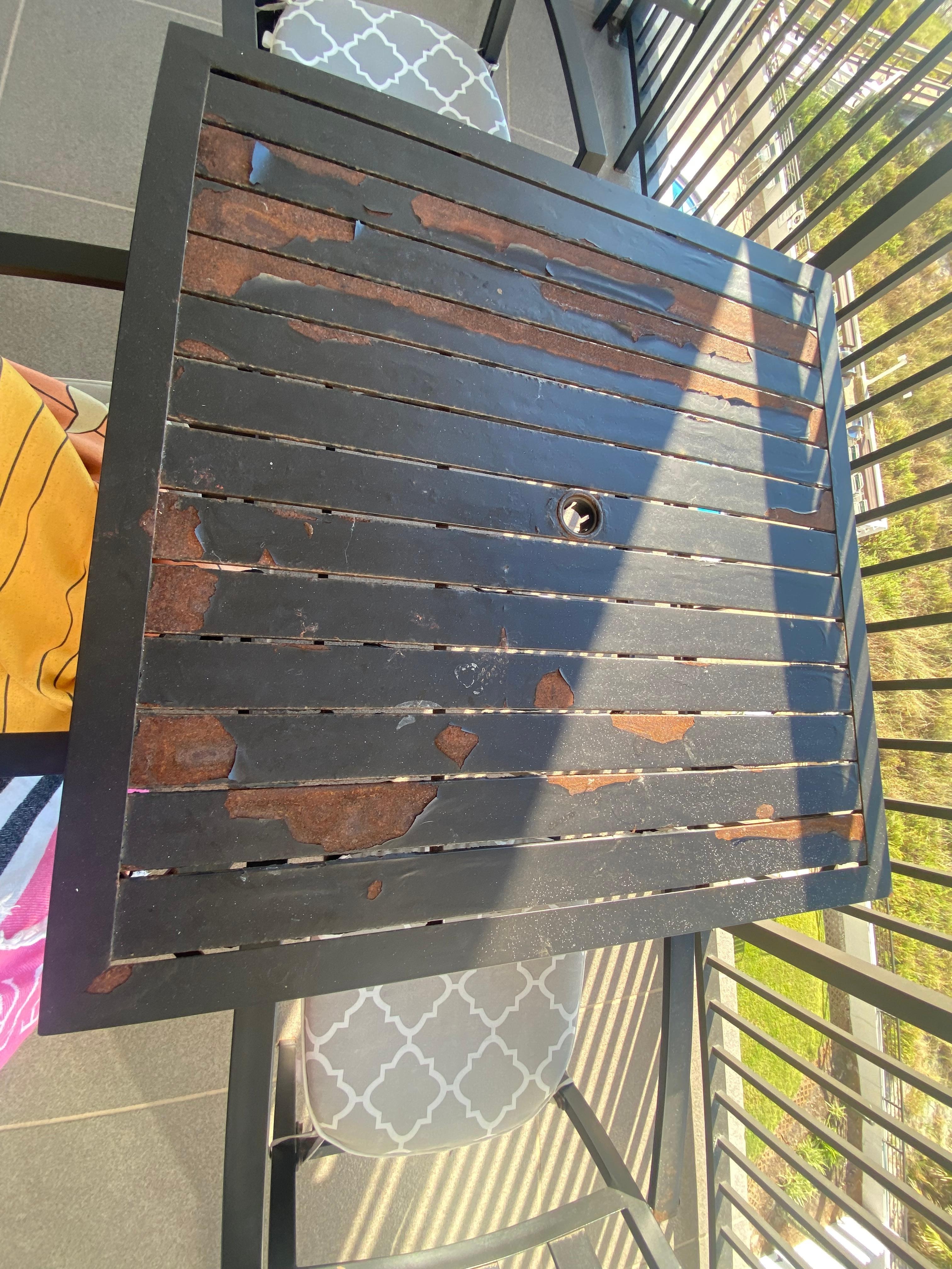 This table is so rusty and old. I should have brought a table cover, so we can enjoy our morning coffee without looking at this ugly table. 
