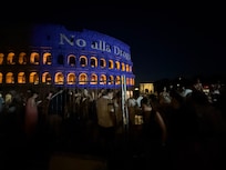Night view of Colosseum with entertainment