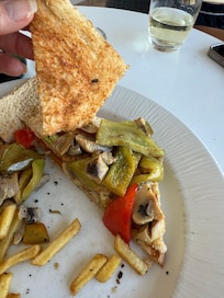 My “ Portabella mushroom, eggplant, roasted red pepper with pesto sauce sandwich” from room service.