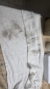 Towel after cleaning up spilled water in the room