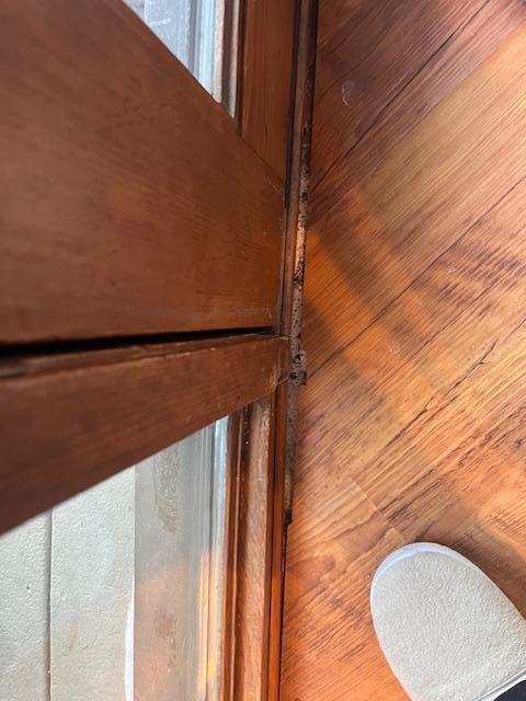 see the gap in flooring to the door to the deck.  awful finish work.  