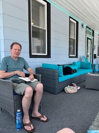 Catching a nice breeze on the lovely front porch!