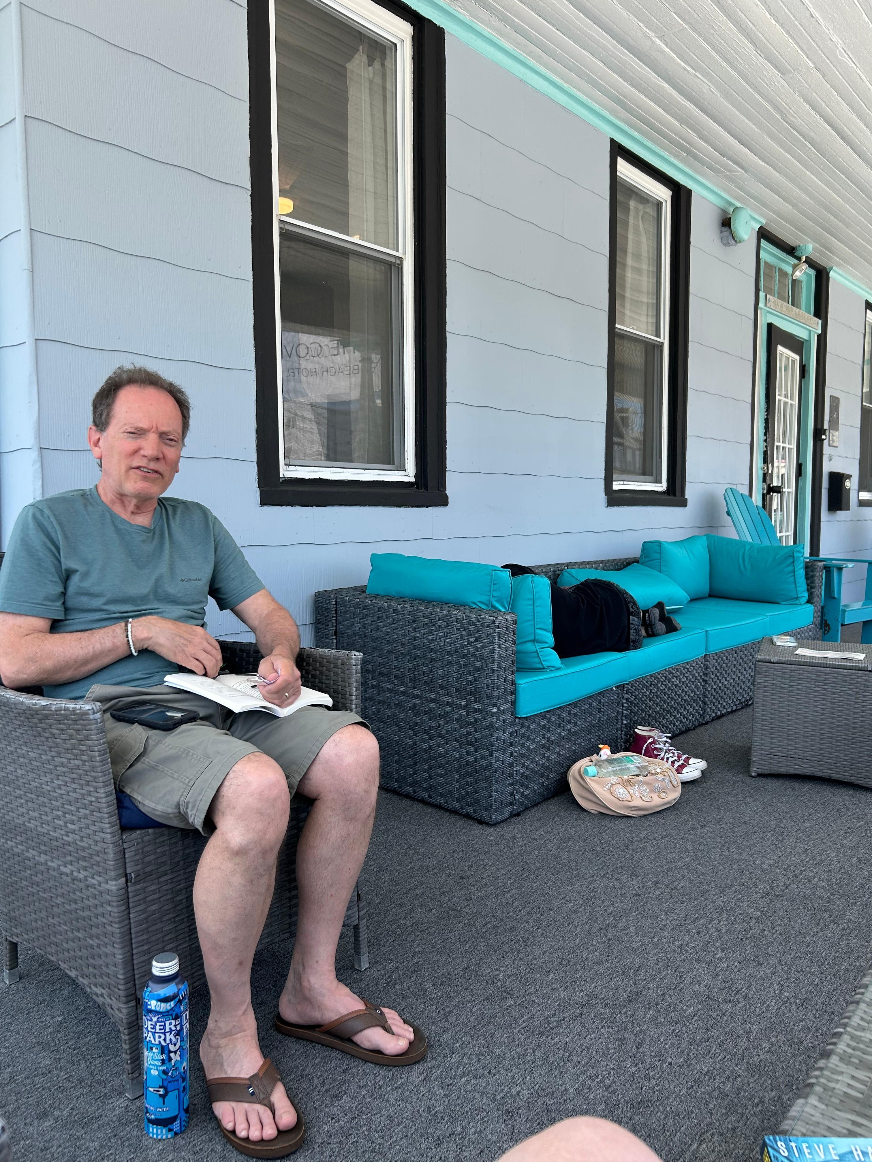 Catching a nice breeze on the lovely front porch! 