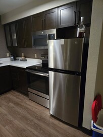 Full fridge and freezer with ice maker