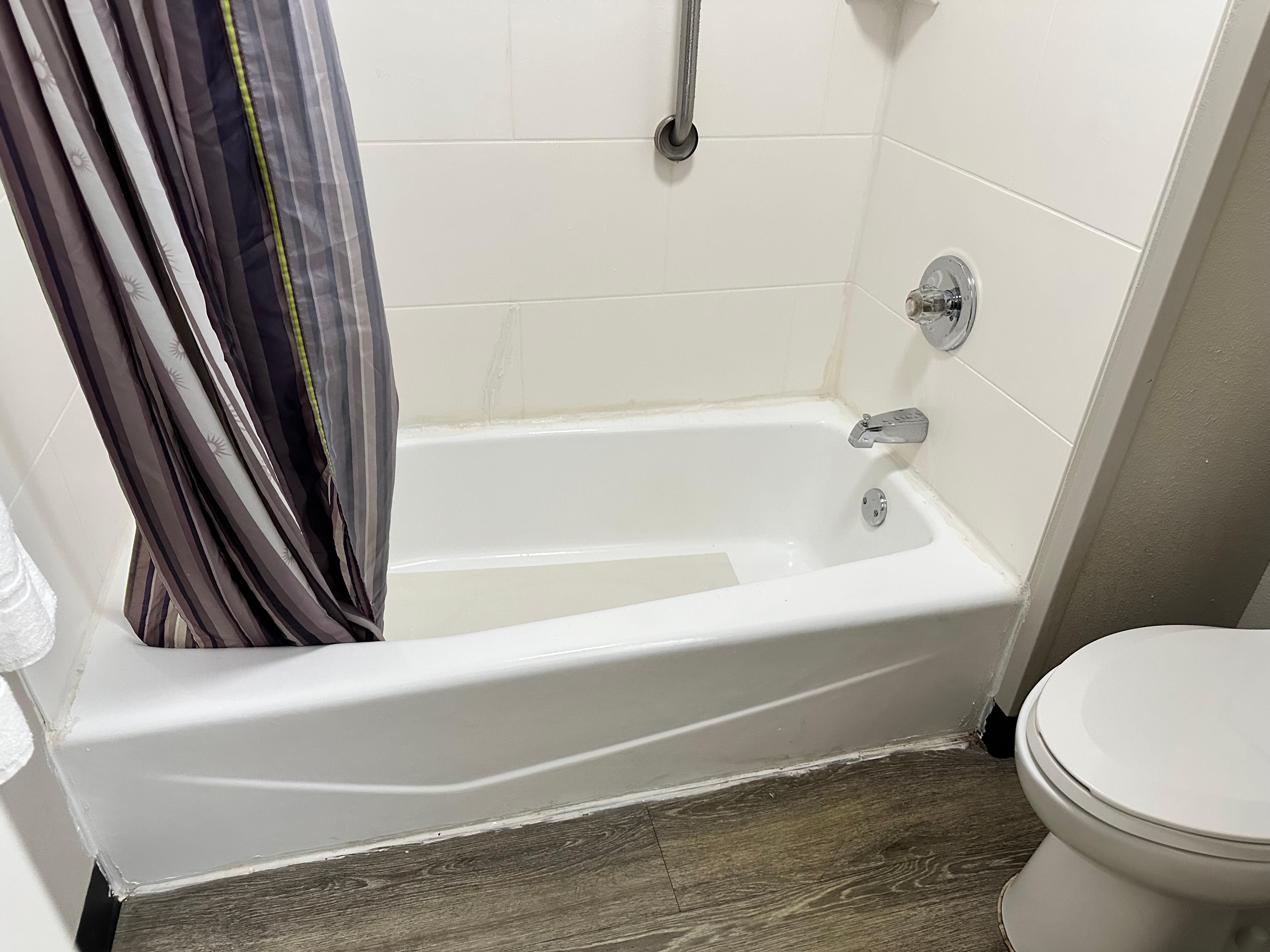 Caulking used to glue together a broken tile