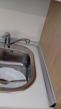 Around the sink. But I wasn't able to upload a video of another area..