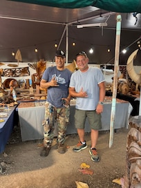 Less than a mile north to the right of glass blower. 6th generation carver.