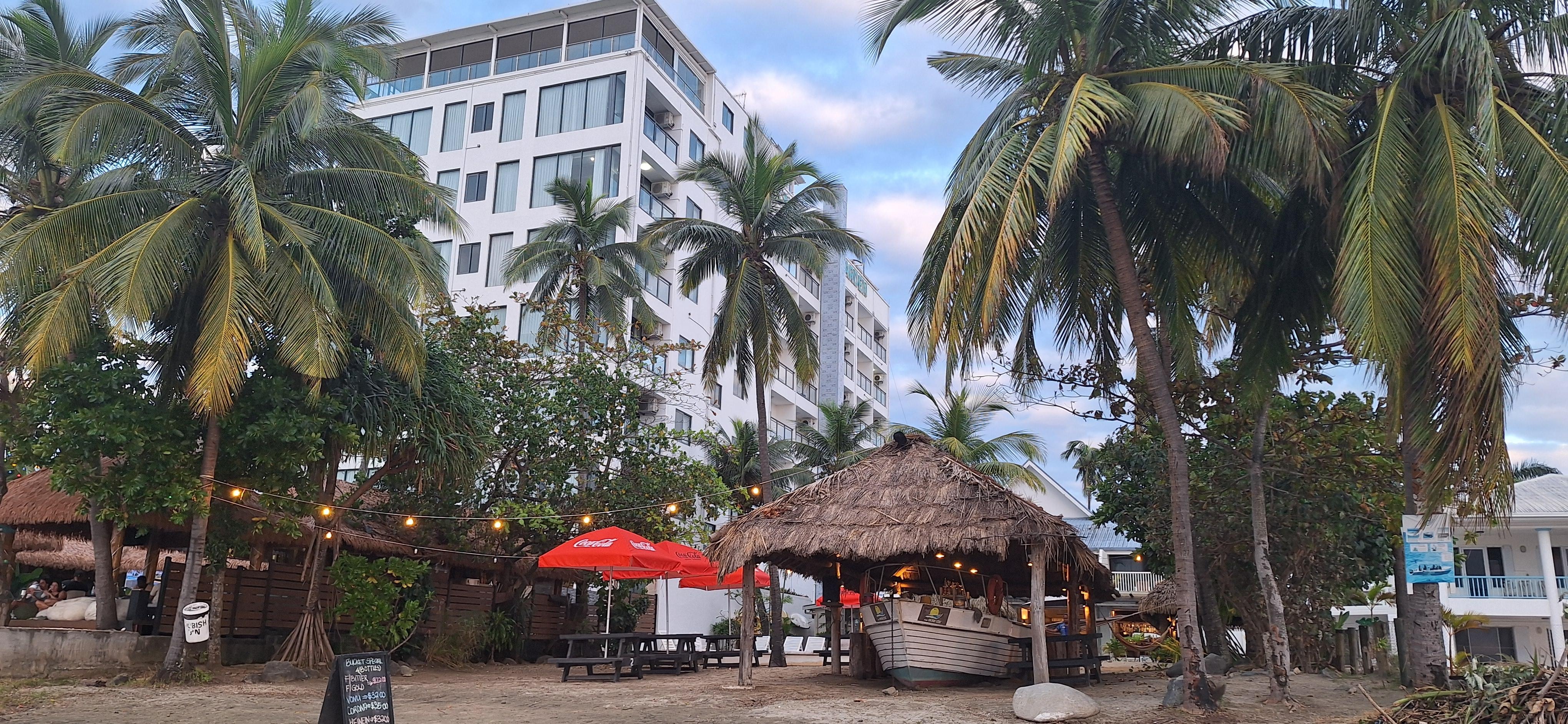 View of the hotel from the beach (not the building to the left. Thats the Wyndham Garden hotel)