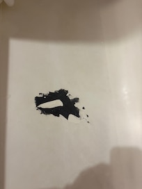 Crack in tub and poor attempt to fix. Crack is not even covered up. Leaked into bedroom. Carpet soaked