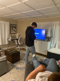 Spacious room with large tv