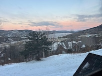 View from the window looking across the blue run and into the village.