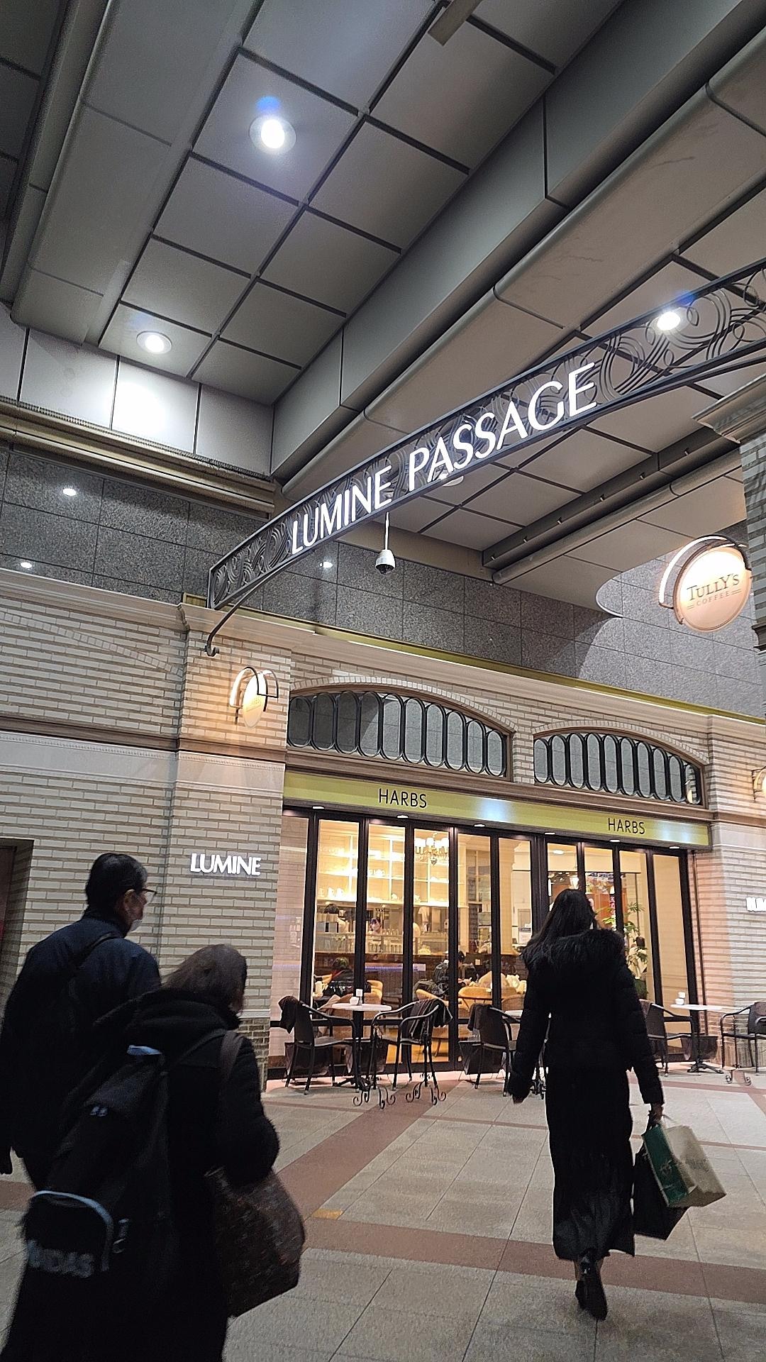 Exit the entrance opposite the front lobby and you will see the shopping center right in front of you.