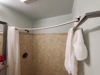 Curtain rod curved inward