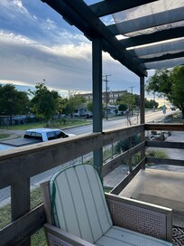 Front patio and side view with the street