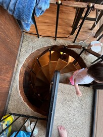 Spiral stair case to the downstairs room