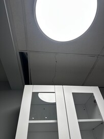Broken and off kilter ceiling tiles everywhere