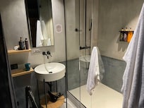 No privacy between shower and sink.