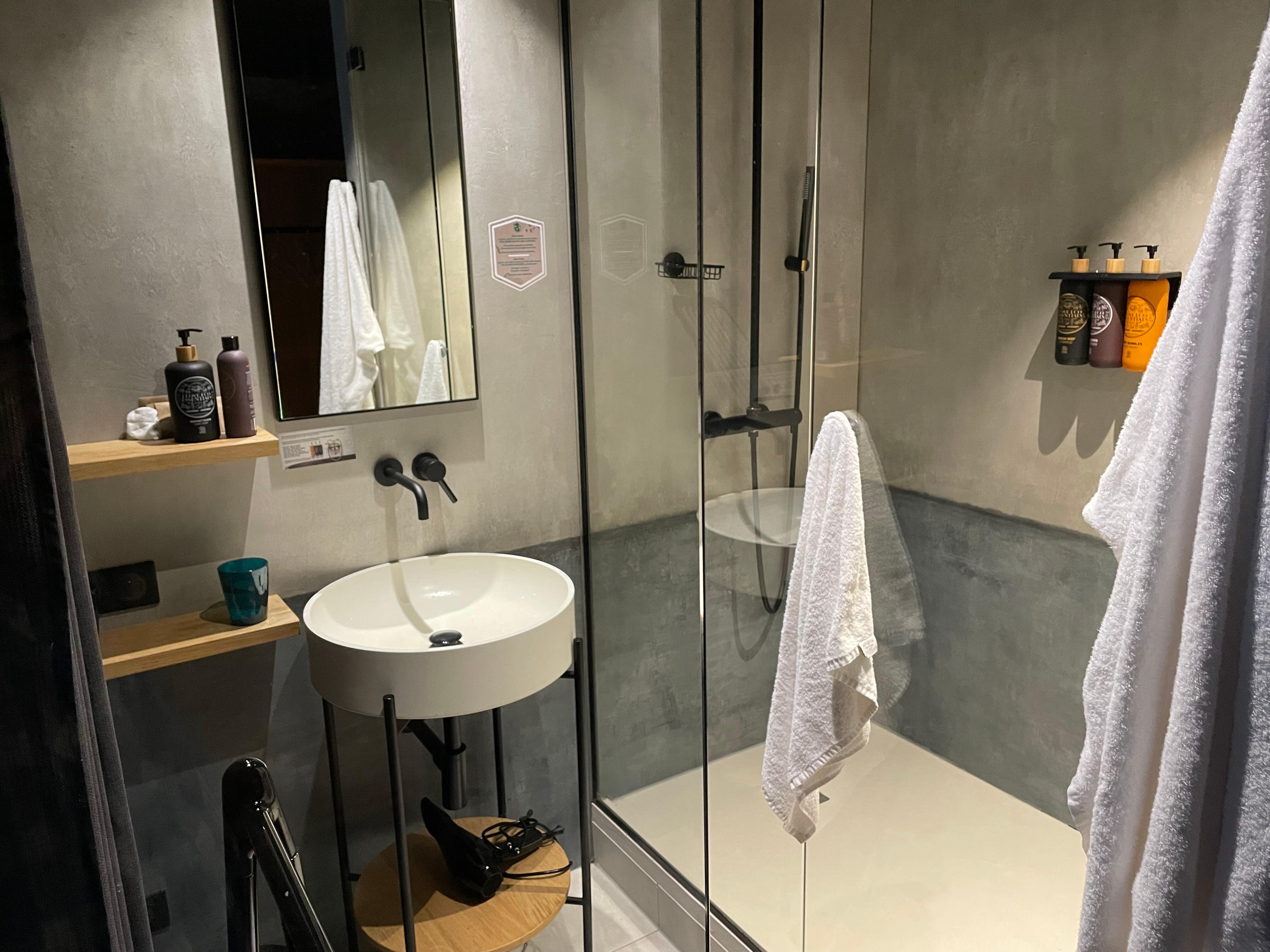 No privacy between shower and sink. 