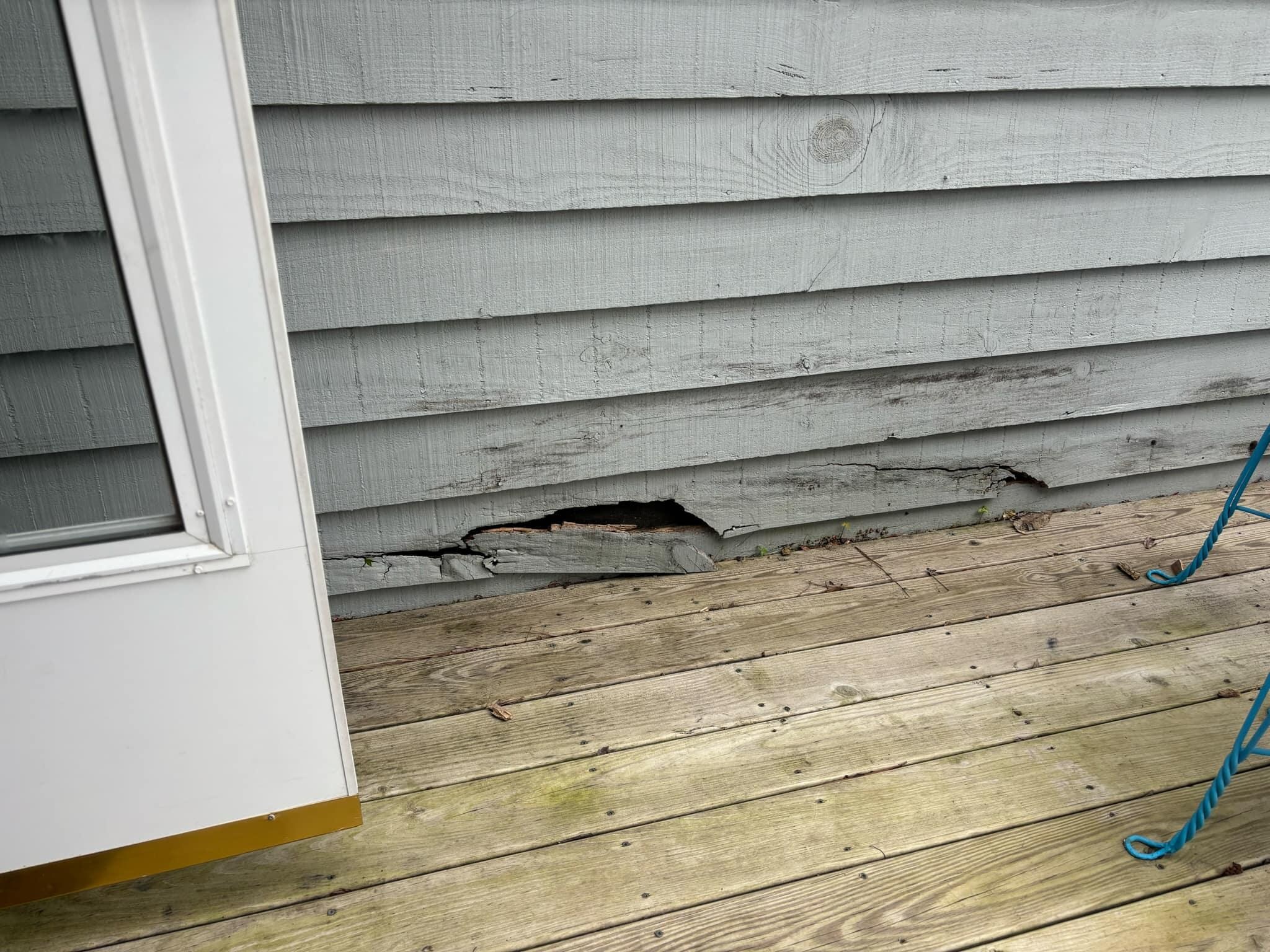 Siding literally falling off the house