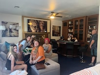 The living room had a poker table that was used repeatedly