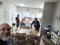 Family dinner after day at the beach