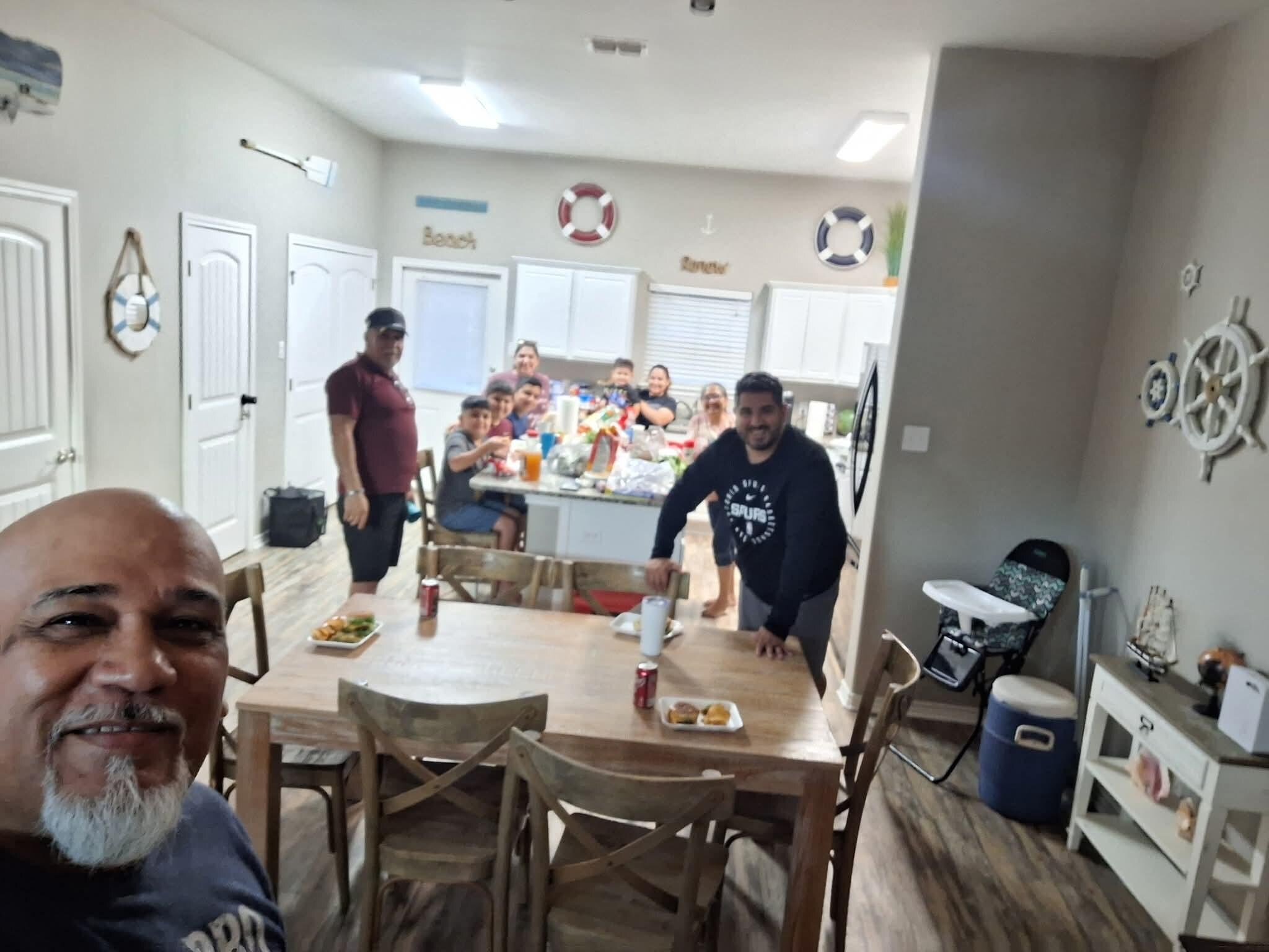 Family dinner after day at the beach