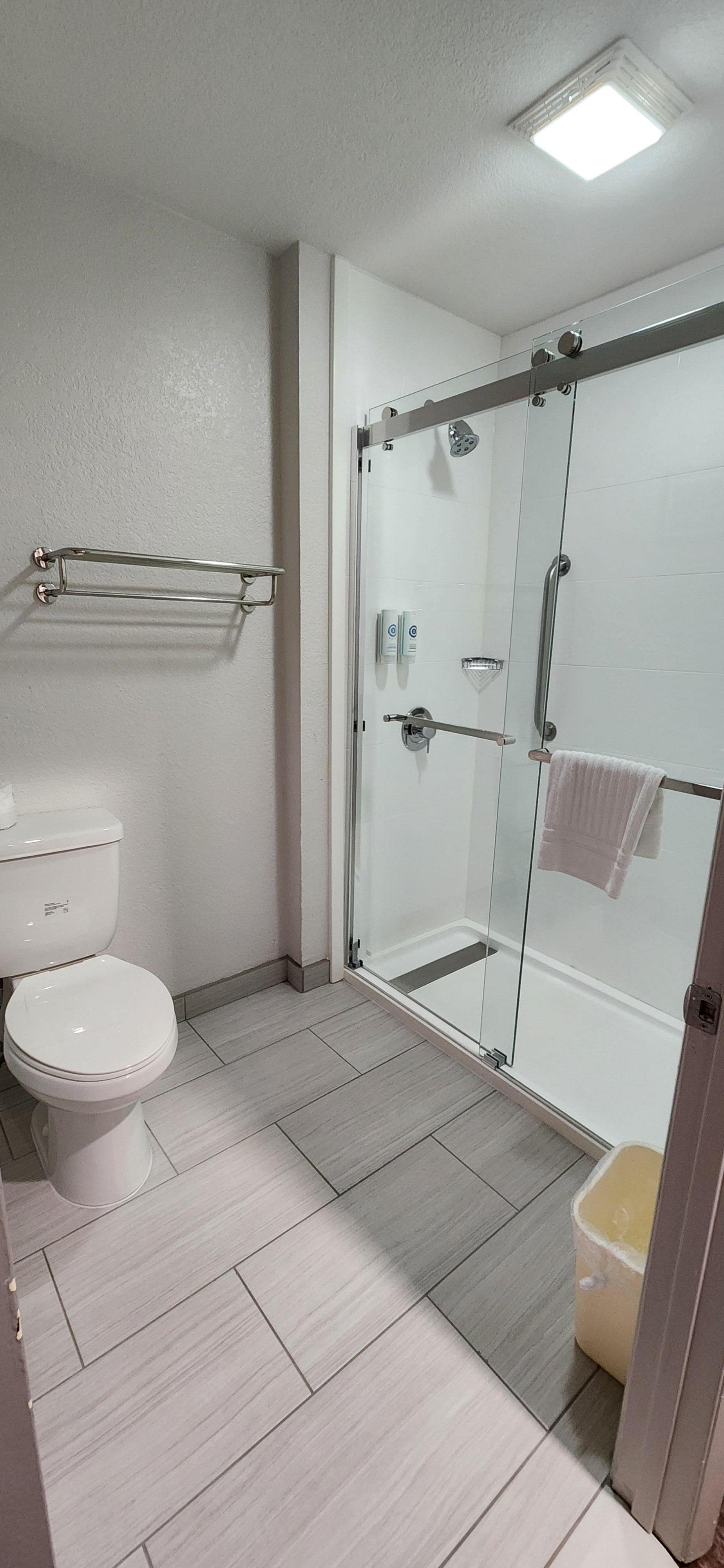 Bathroom with walk-in shower.