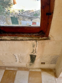 Damp walls outside bedrooms