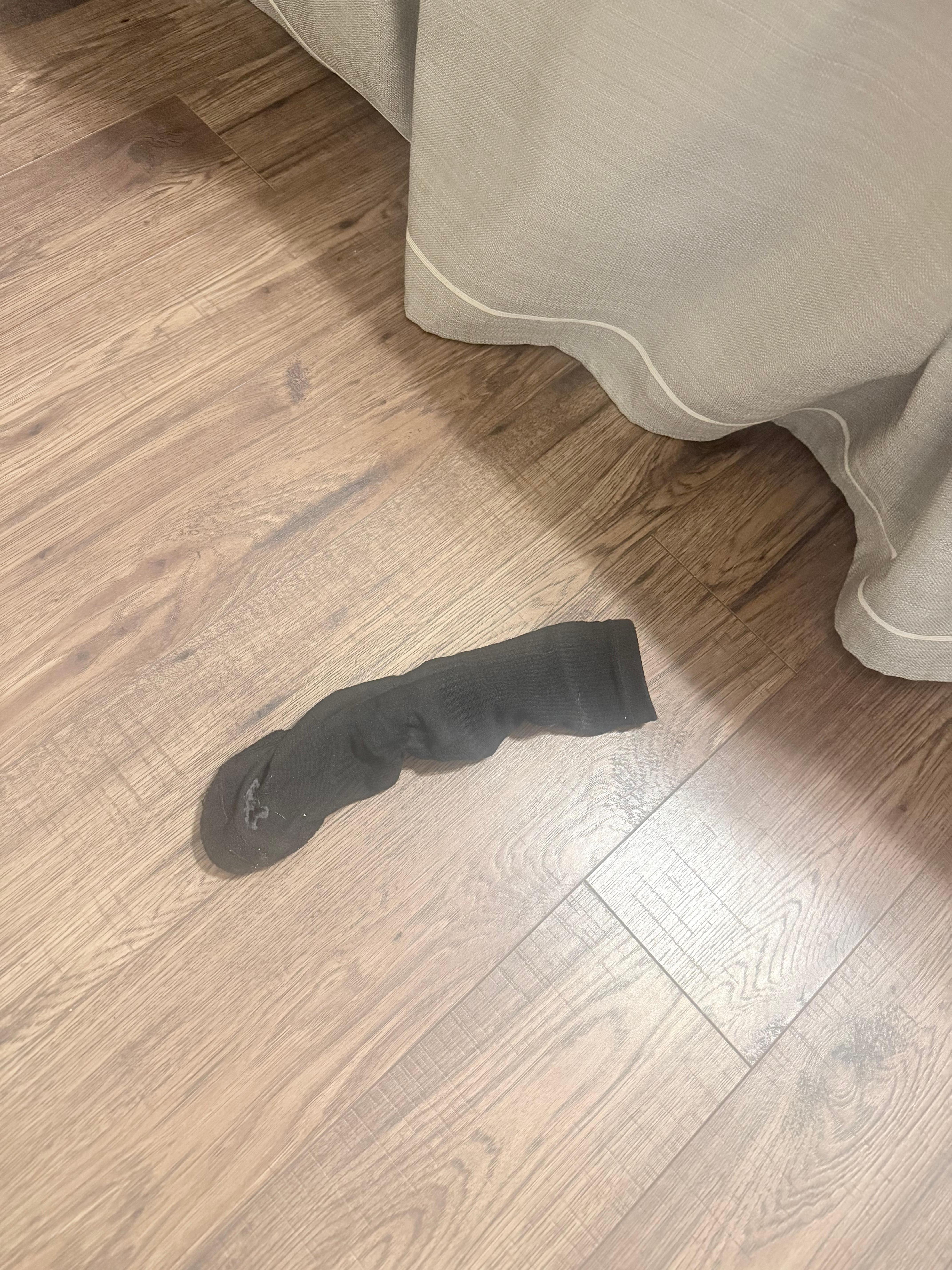 Dirty sock under bed