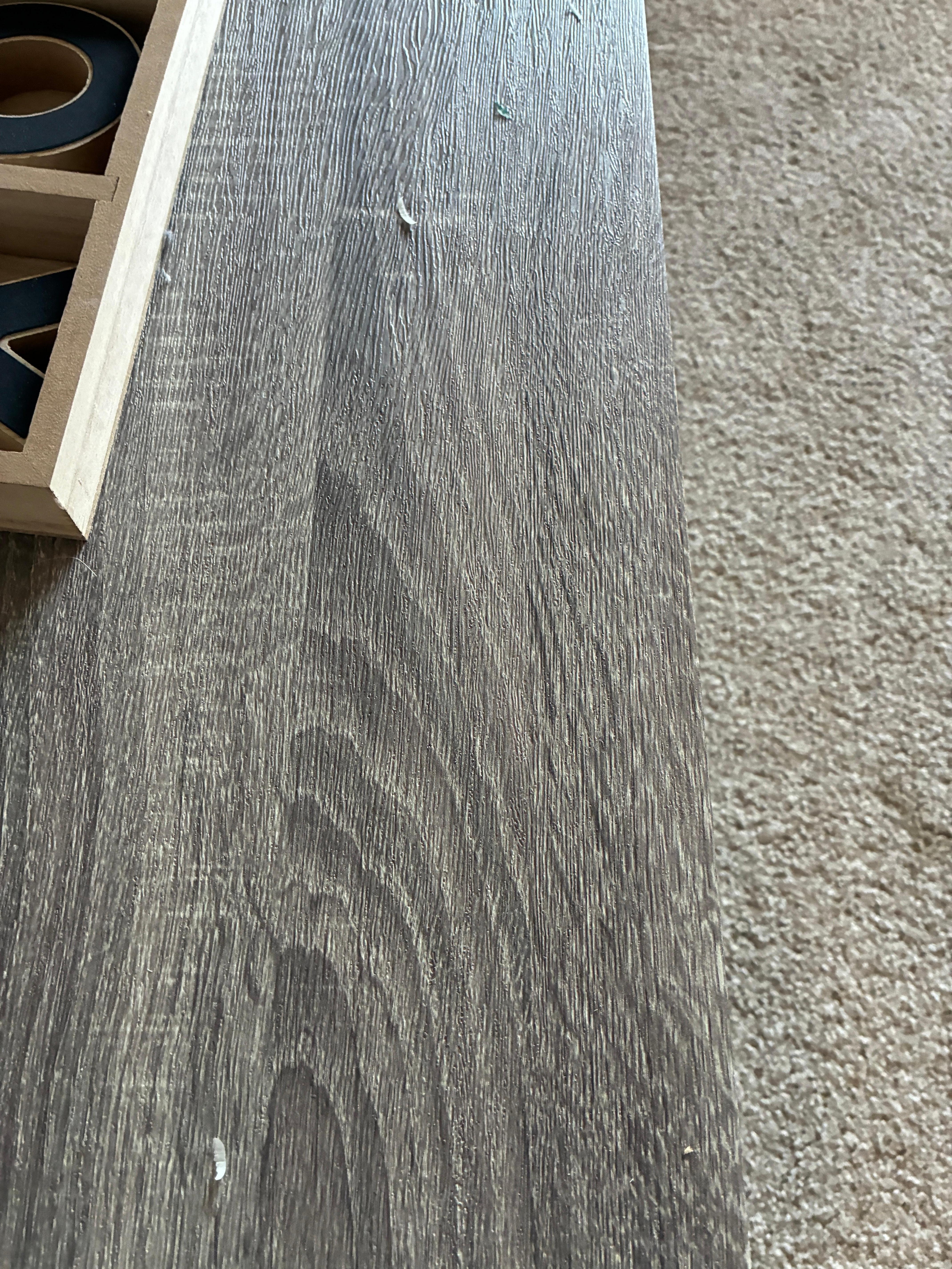 Fingernails on coffee table upon arrival.