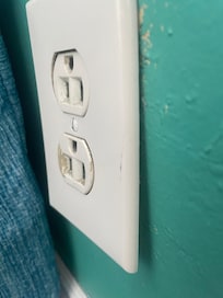 Not flush against wall. Could be hazardous