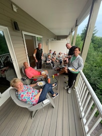 Deck accommodate some overflow family during one of our dinner hostings