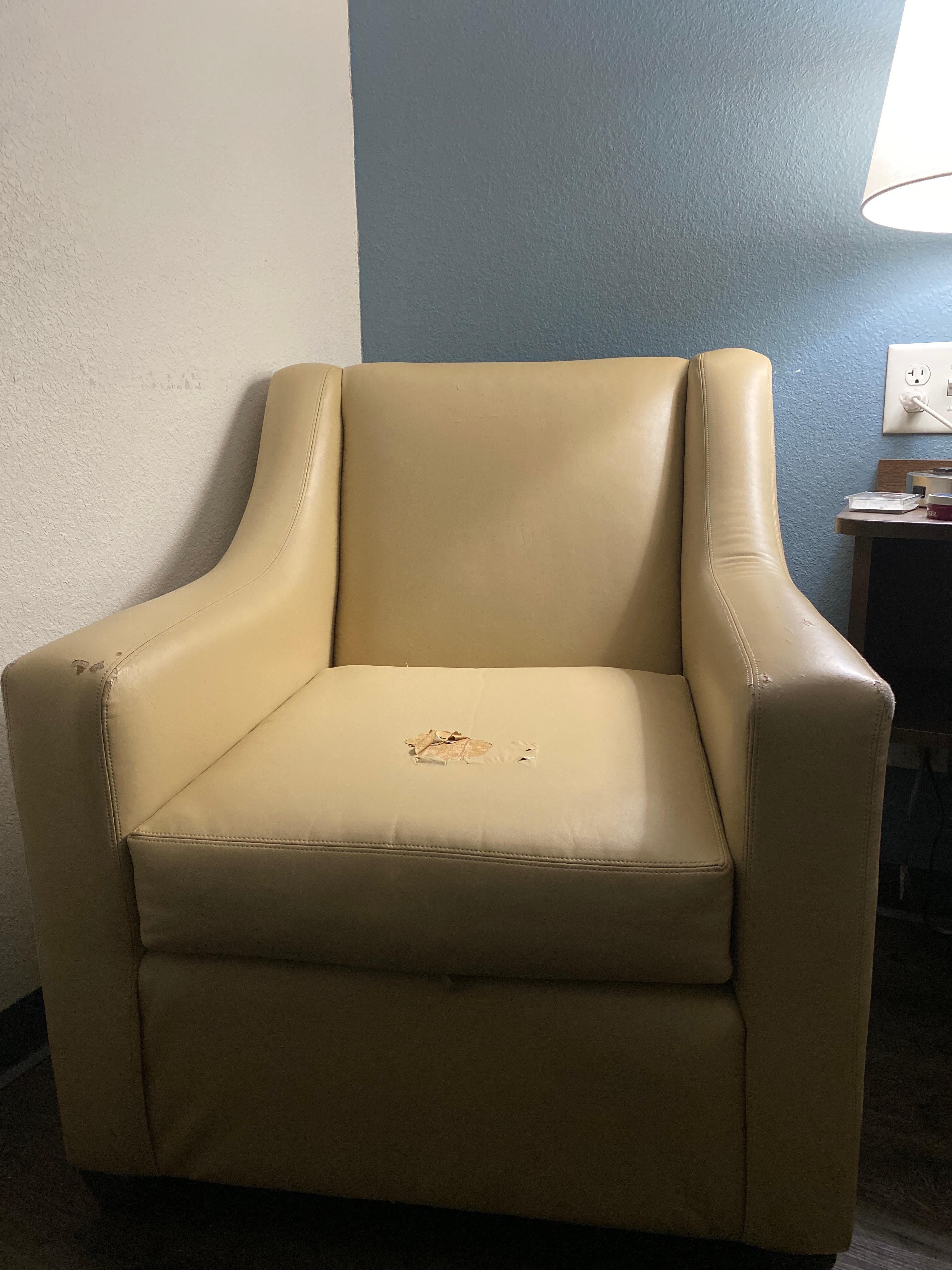 Chair beside bed