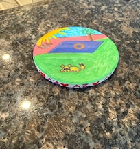 My wife created custom coasters to leave for future guests.