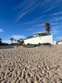 Looking at the home on the beach