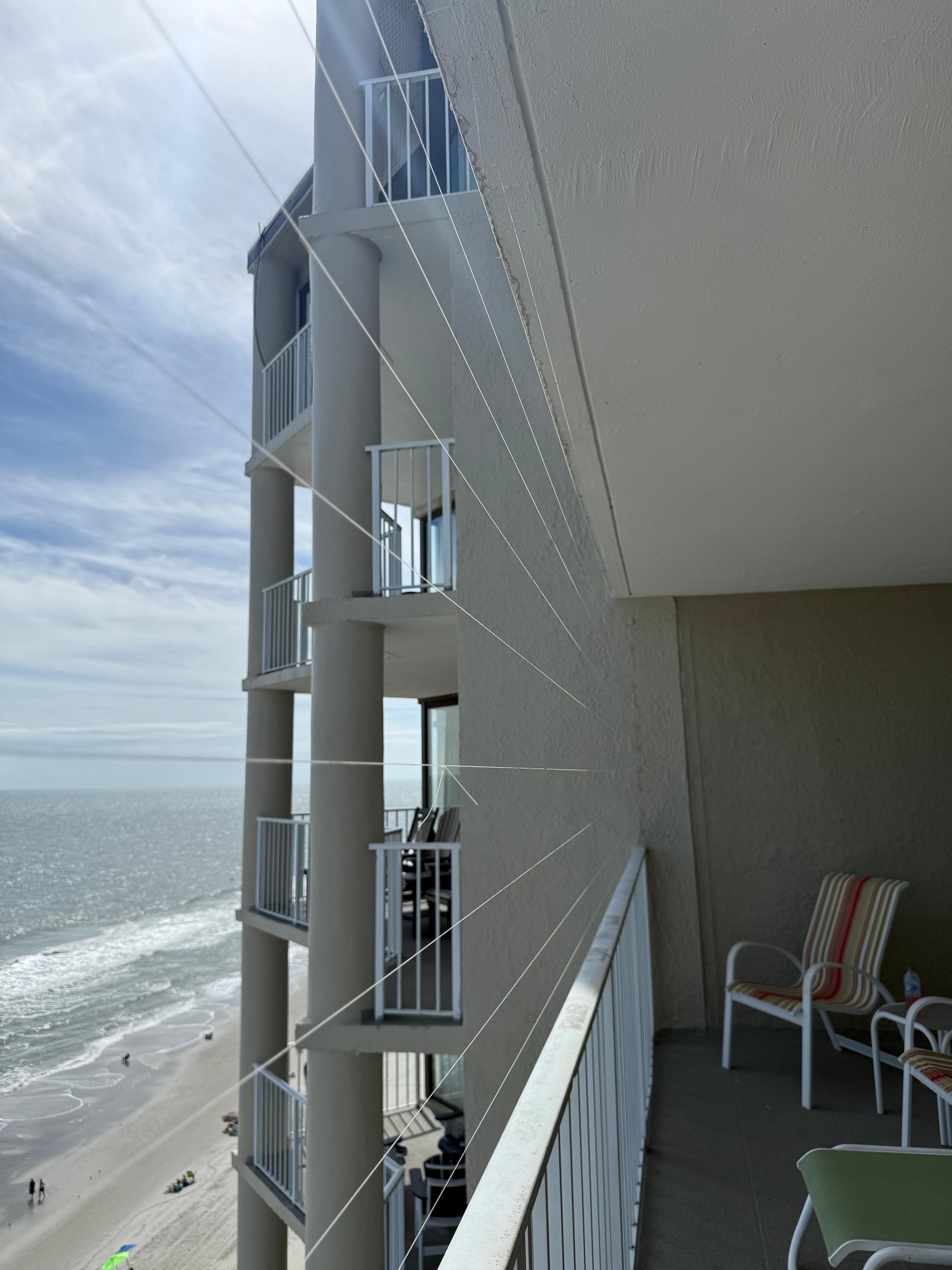 Bird deterrent string on balcony 
